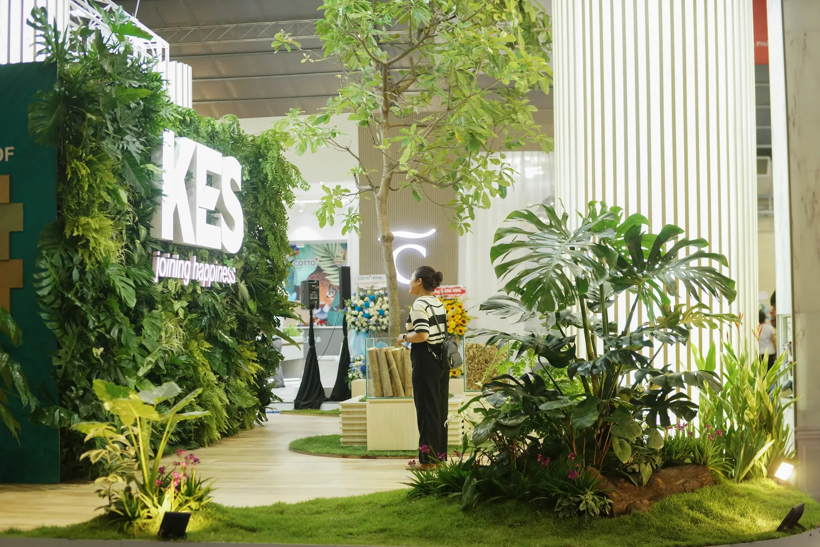 Angled view of the tall green facade at the KES Vietbuild booth
